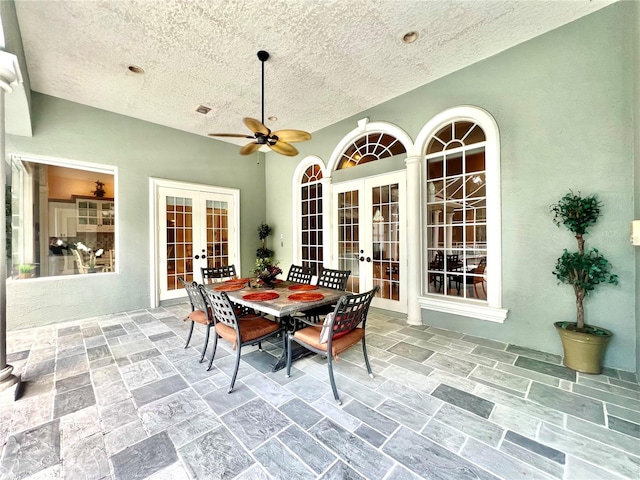 view of patio / terrace featuring french doors and ceiling fan