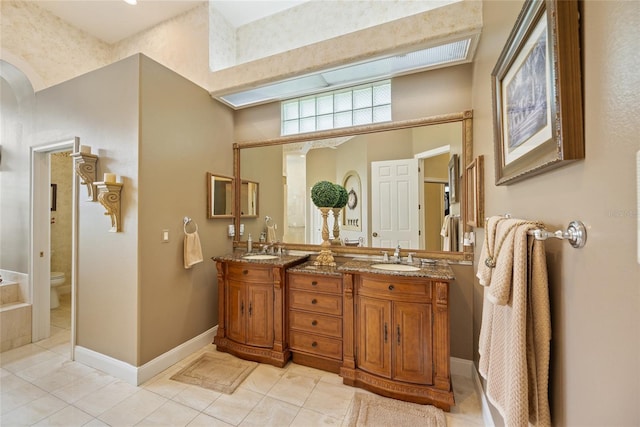 168 Rue Des Chateaux, Tarpon Springs, FL 34688 - bathroom featuring tile patterned floors and double vanity