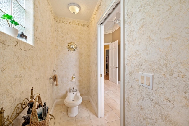 168 Rue Des Chateaux, Tarpon Springs, FL 34688 - bathroom featuring a bidet and tile patterned flooring