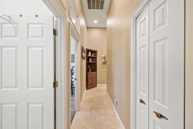 168 Rue Des Chateaux, Tarpon Springs, FL 34688 - corridor featuring baseboards and recessed lighting
