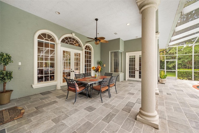 168 Rue Des Chateaux, Tarpon Springs, FL 34688 - view of patio / terrace featuring french doors, glass enclosure, and ceiling fan