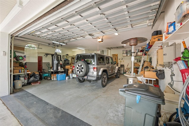168 Rue Des Chateaux, Tarpon Springs, FL 34688 - garage featuring a garage door opener