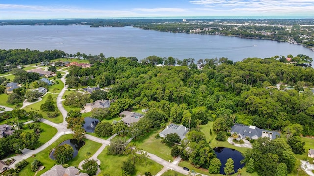 168 Rue Des Chateaux, Tarpon Springs, FL 34688 - aerial view of property and surrounding area with a large body of water and nearby suburban area