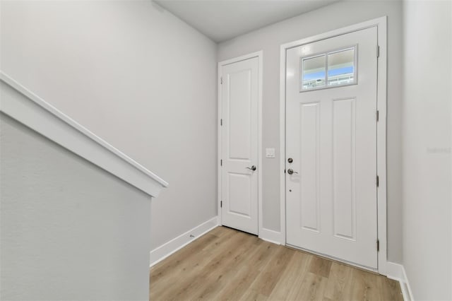 foyer with light hardwood / wood-style flooring