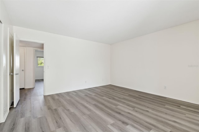 unfurnished room featuring light hardwood / wood-style flooring