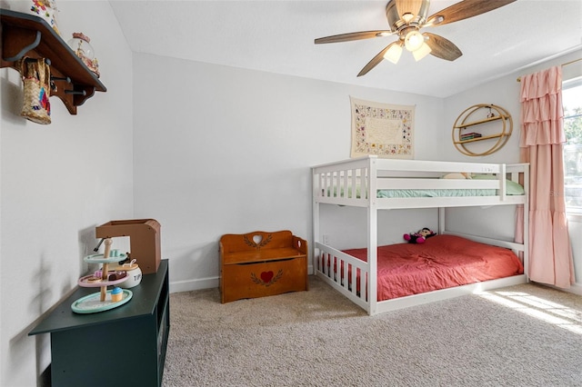 bedroom with ceiling fan and carpet flooring