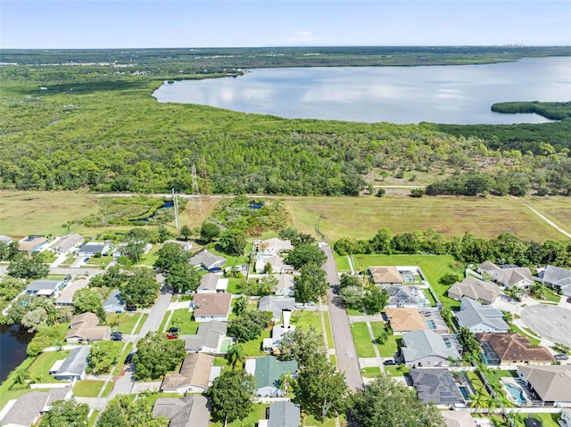 bird's eye view with a water view and a residential view