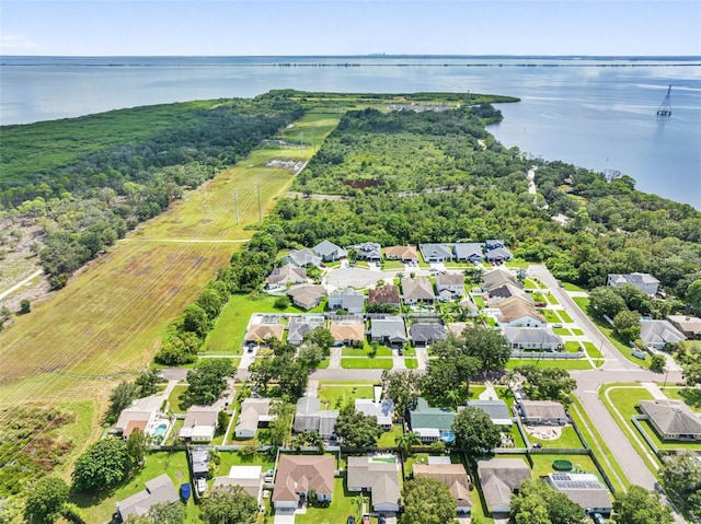 aerial view with a residential view and a water view