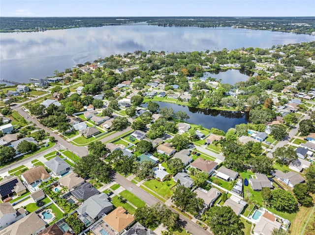 aerial view featuring a residential view and a water view