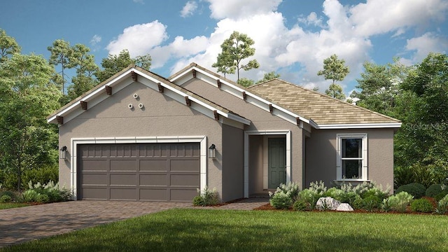 view of front facade featuring a garage and a front lawn