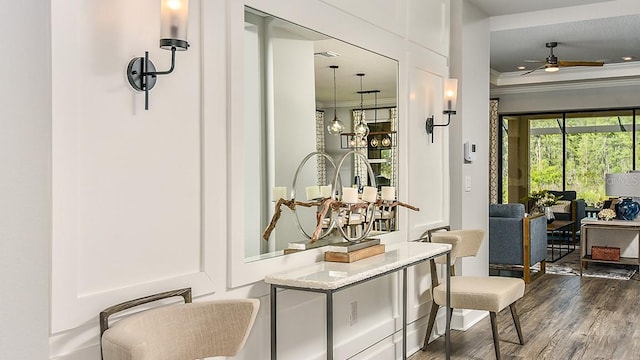 interior space featuring dark hardwood / wood-style floors and ornamental molding