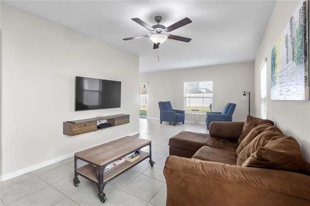 tiled living room featuring ceiling fan