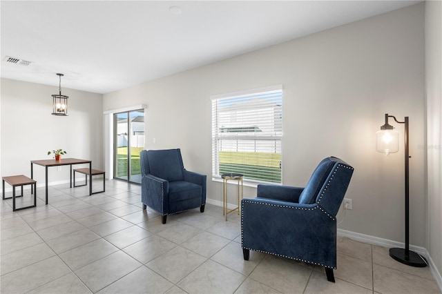 living area with light tile patterned floors