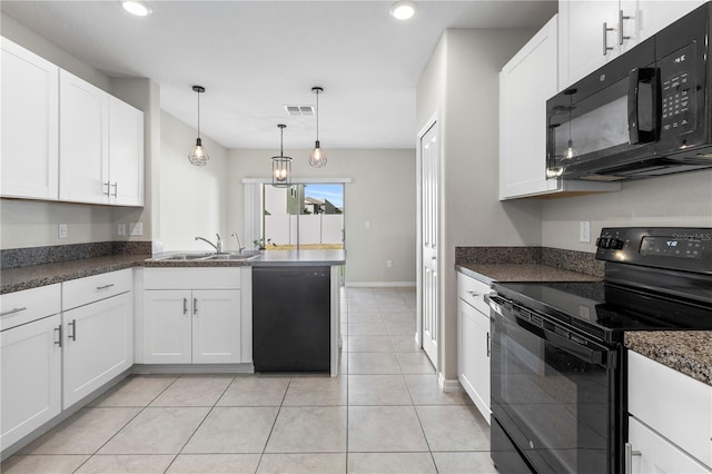 kitchen with white cabinetry, black appliances, sink, and hanging light fixtures