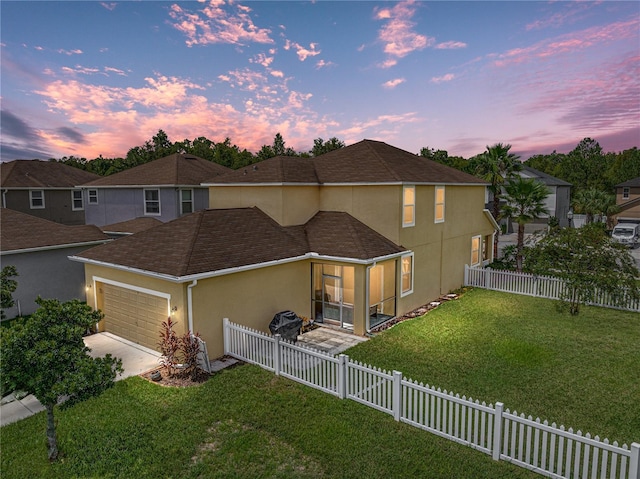 8720 Savory Walk Dr, Land O Lakes, FL 34637 - view of front facade with a garage, stucco siding, a sunroom, a front yard, and concrete driveway