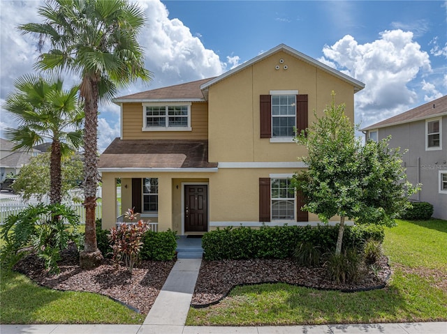 view of front of home featuring a front lawn