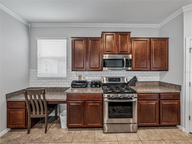 kitchen with light tile patterned flooring, crown molding, stainless steel appliances, and backsplash