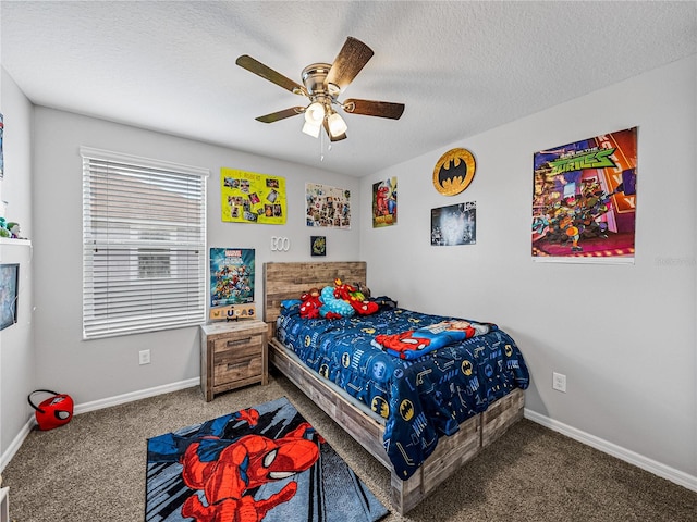 bedroom with carpet flooring, a textured ceiling, and ceiling fan