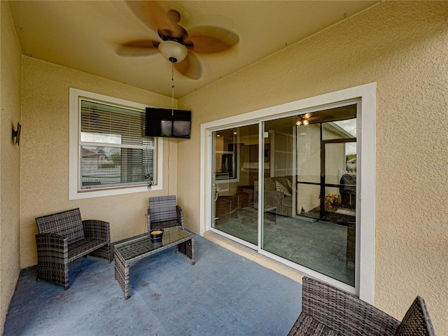 view of patio / terrace with ceiling fan