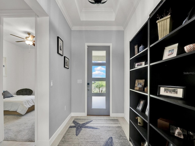 interior space with crown molding, light wood-type flooring, and ceiling fan