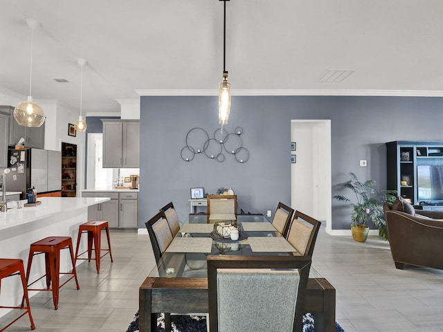 dining room with ornamental molding