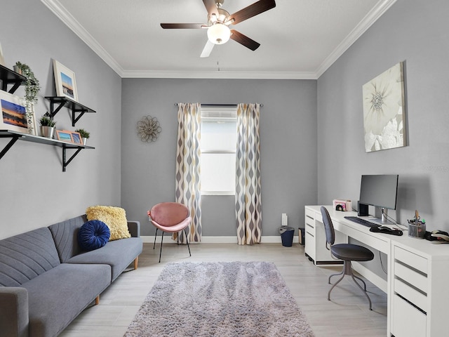 office with crown molding, light wood-type flooring, and ceiling fan