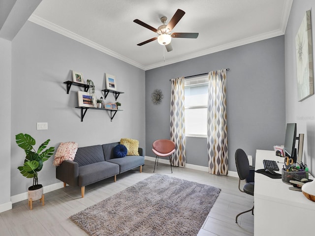 office featuring crown molding, light wood-type flooring, and ceiling fan