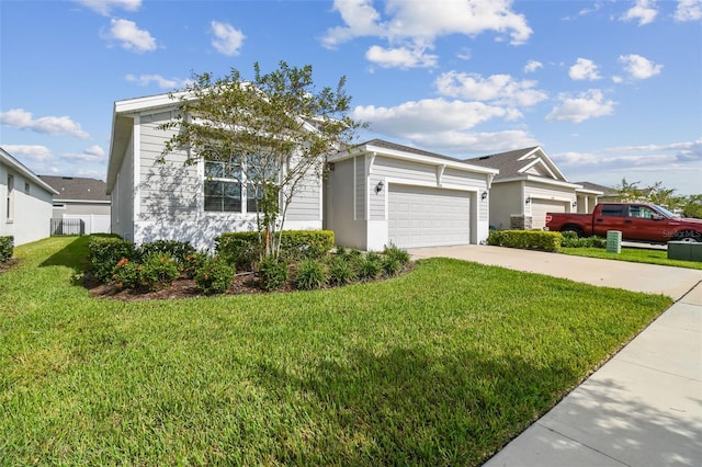 view of front facade with a front lawn and a garage