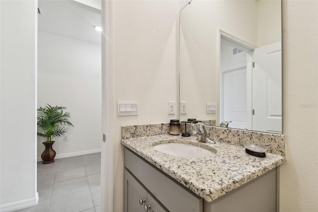 bathroom featuring vanity and tile patterned flooring