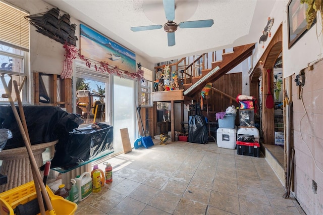 storage area with ceiling fan