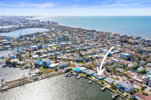 bird's eye view with a residential view and a water view