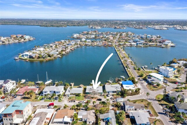 birds eye view of property with a residential view and a water view