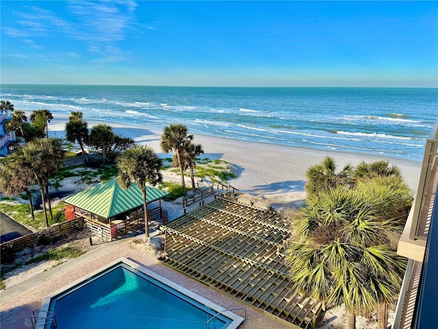 property view of water featuring a beach view