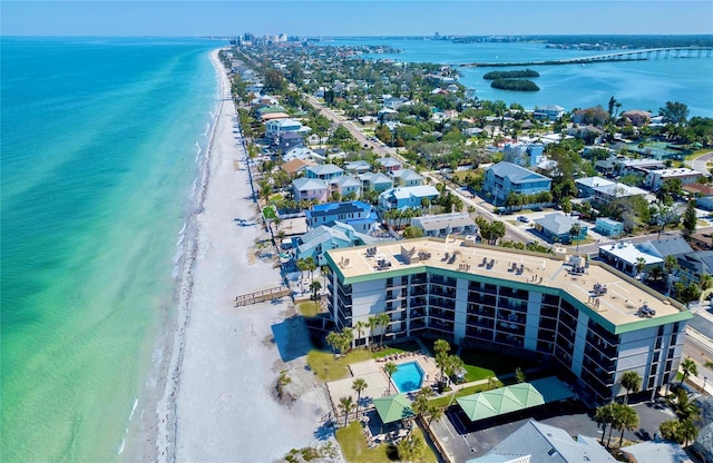 bird's eye view of waterfront with a beach