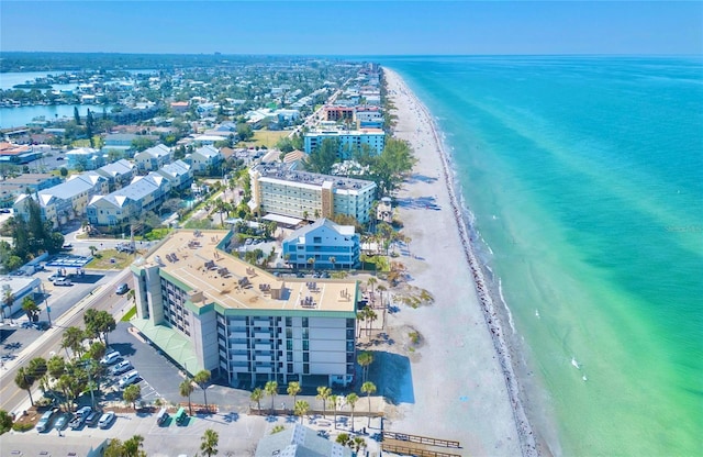 drone / aerial view of waterfront with a beach