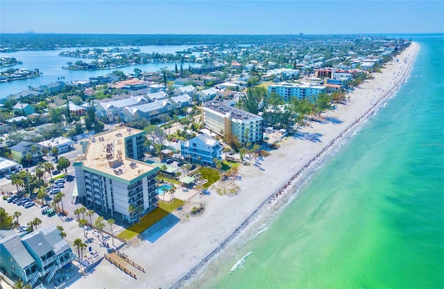 drone / aerial view of waterfront with a beach