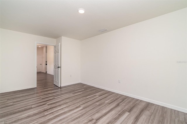 empty room featuring light wood-type flooring