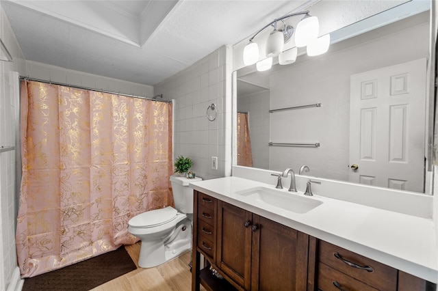 bathroom featuring toilet, a shower with curtain, vanity, and wood-type flooring