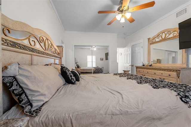 bedroom with crown molding, a closet, and ceiling fan