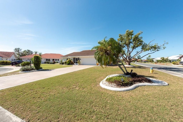 view of front facade featuring a front lawn and a garage