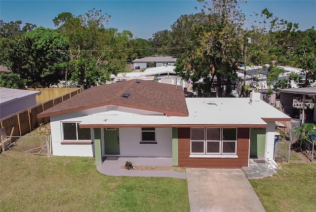 exterior space featuring a front lawn