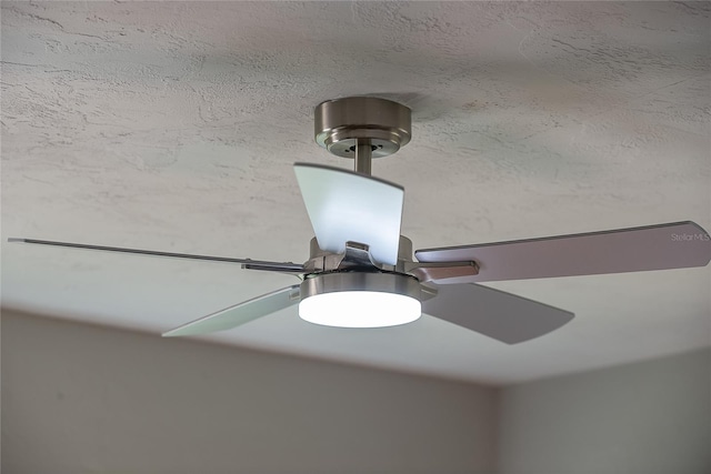 interior details with a textured ceiling