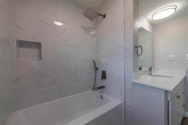 1328 Barry St, Clearwater, FL 33756 - bathroom featuring vanity and washtub / shower combination