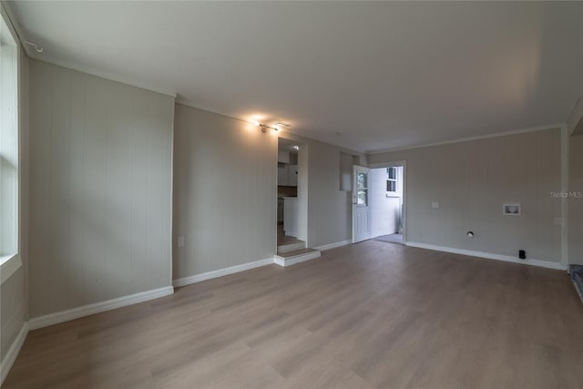 unfurnished living room with light wood-type flooring