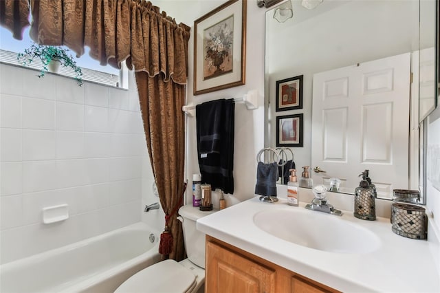 full bathroom featuring toilet, vanity, and shower / tub combo