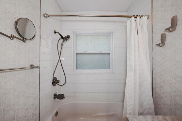 bathroom with shower / bathtub combination with curtain