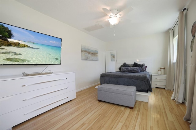 bedroom with light hardwood / wood-style flooring and ceiling fan