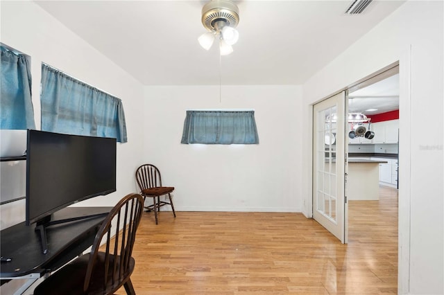 home office with light wood-type flooring