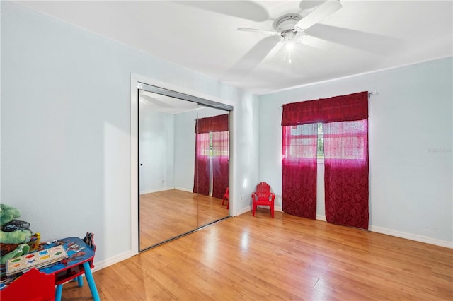 empty room featuring hardwood / wood-style floors and ceiling fan