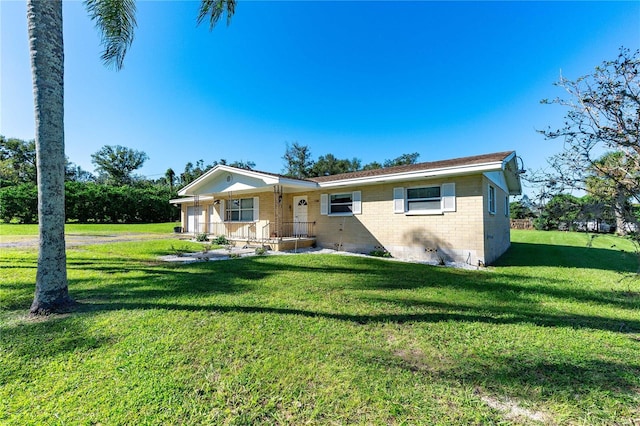 ranch-style home with a front yard